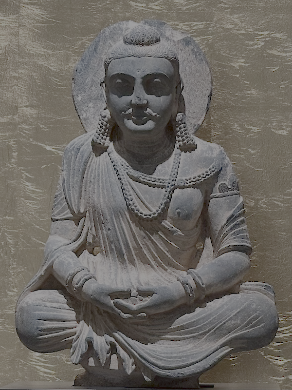 A statue of a Buddha with hands in the "cosmic mudra"